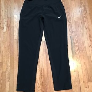 Nike women’s dri fit pant with zippers on lower legs. Black. Like new! Size L.